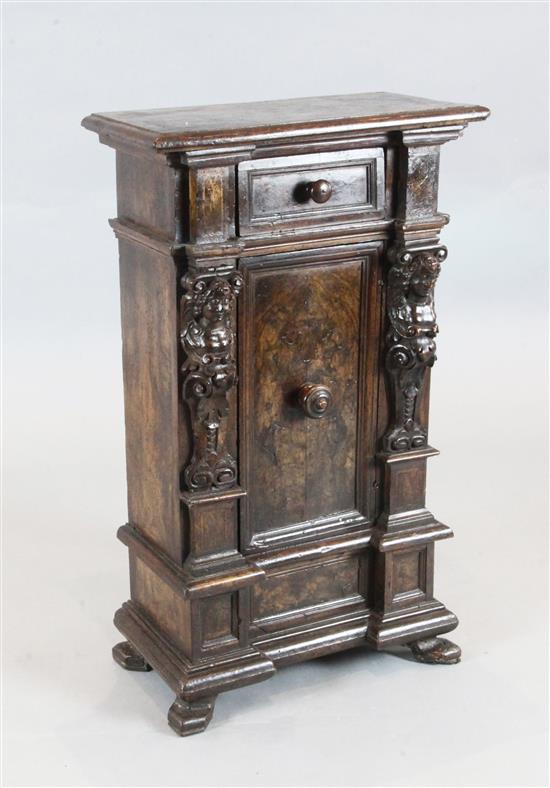 A 17th century Italian walnut small cupboard, W.1ft 9in. D.10.5in. H.2ft 11in.